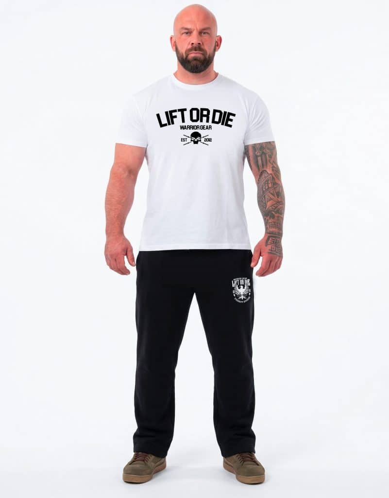 Warrior Gear black jogging pants with Strength Division logo worn by an athlete.