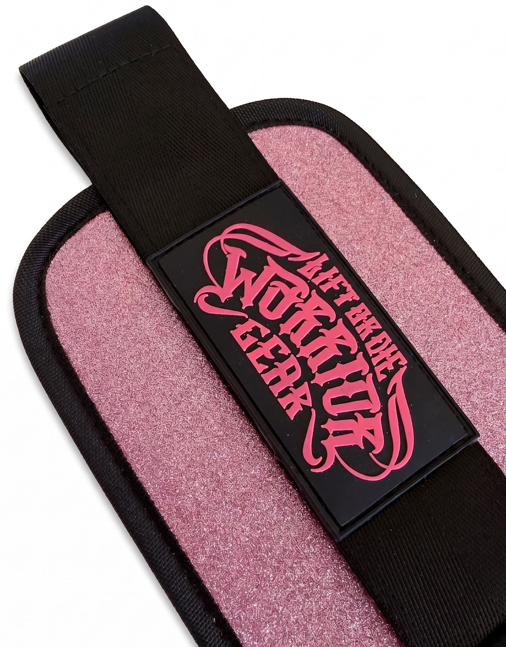 Close-up of the Lift or Die Warrior Gear embossed patch and the pink glitter finish of the hip thrust belt.