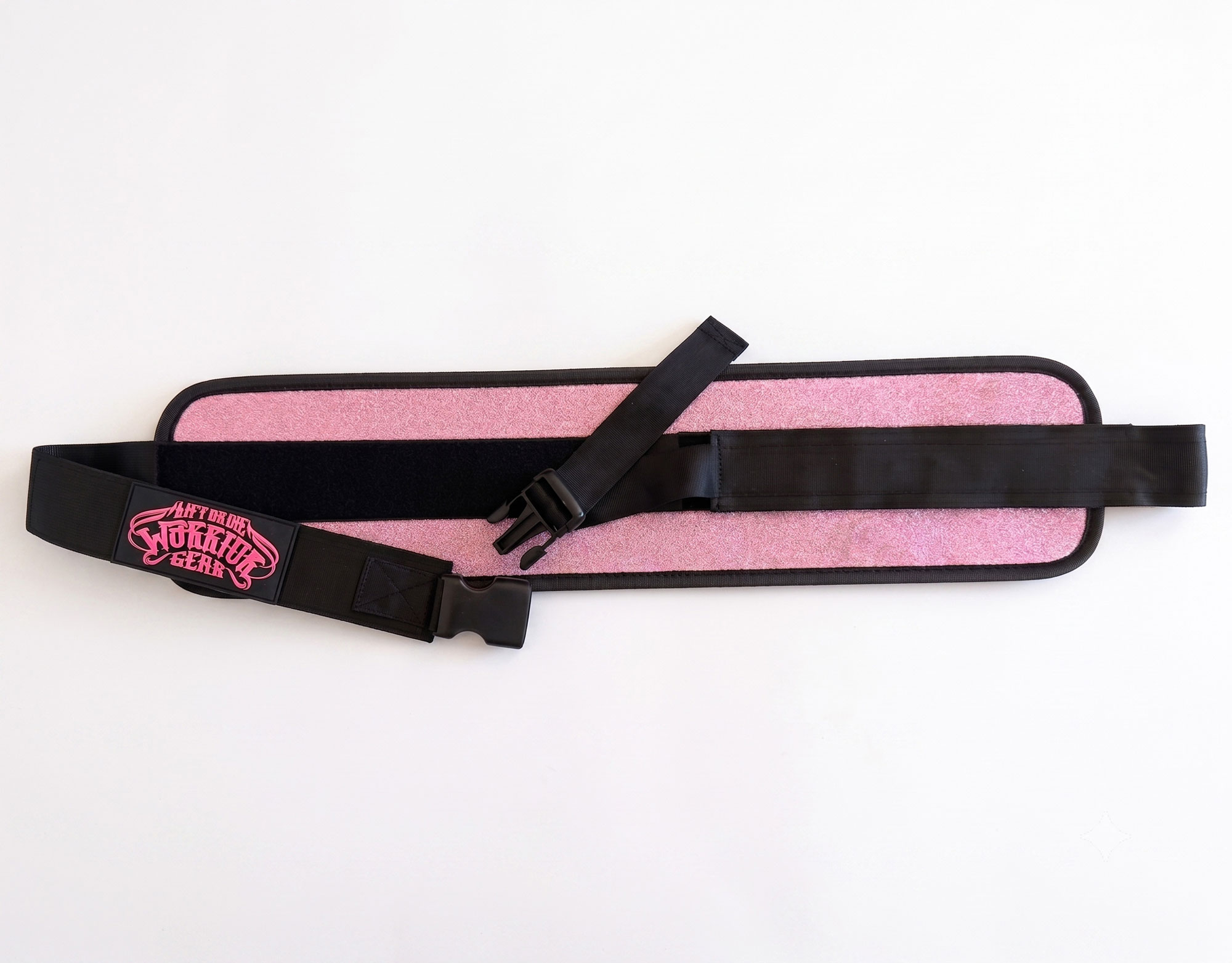 Adjustable strap and clip buckle of the glittery pink hip thrust belt for dumbbells and kettlebells.